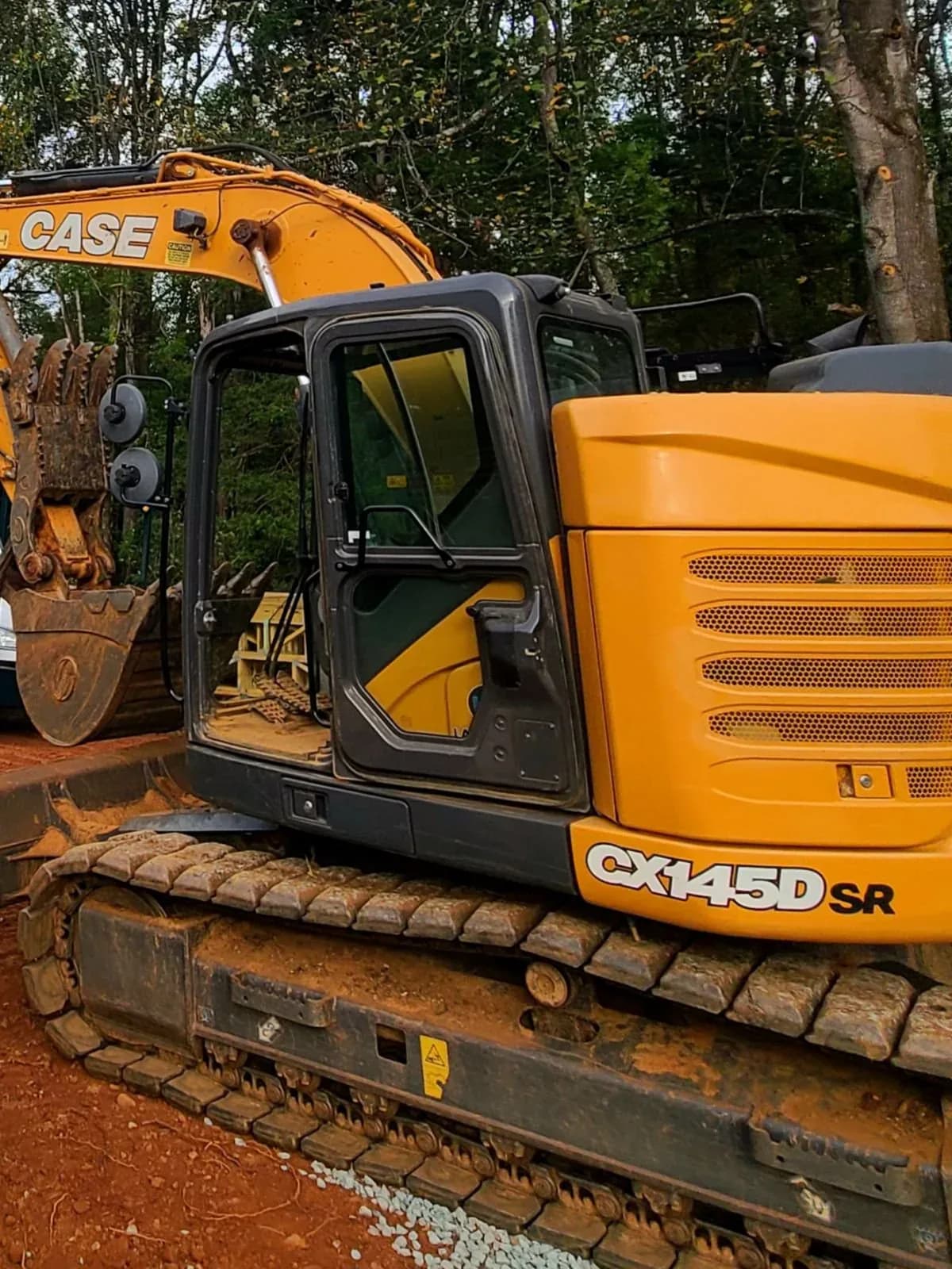 Scott's Backhoe Service CASE CX145D SR excavator on a job site in Fluvanna County, Virginia